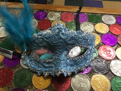 ASSORTED COLOR BRAIDED GLITTER MASK WITH FEATHER