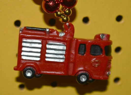 FIREMAN TRUCK MEDALLION